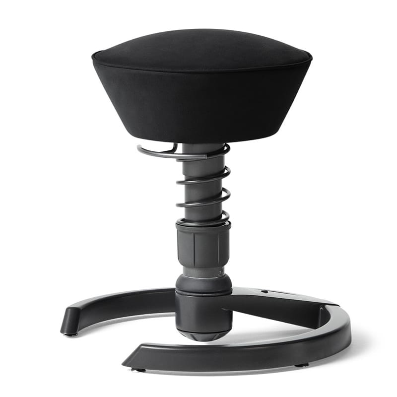 A black saddle stool on a sprung central column with a three-point base.